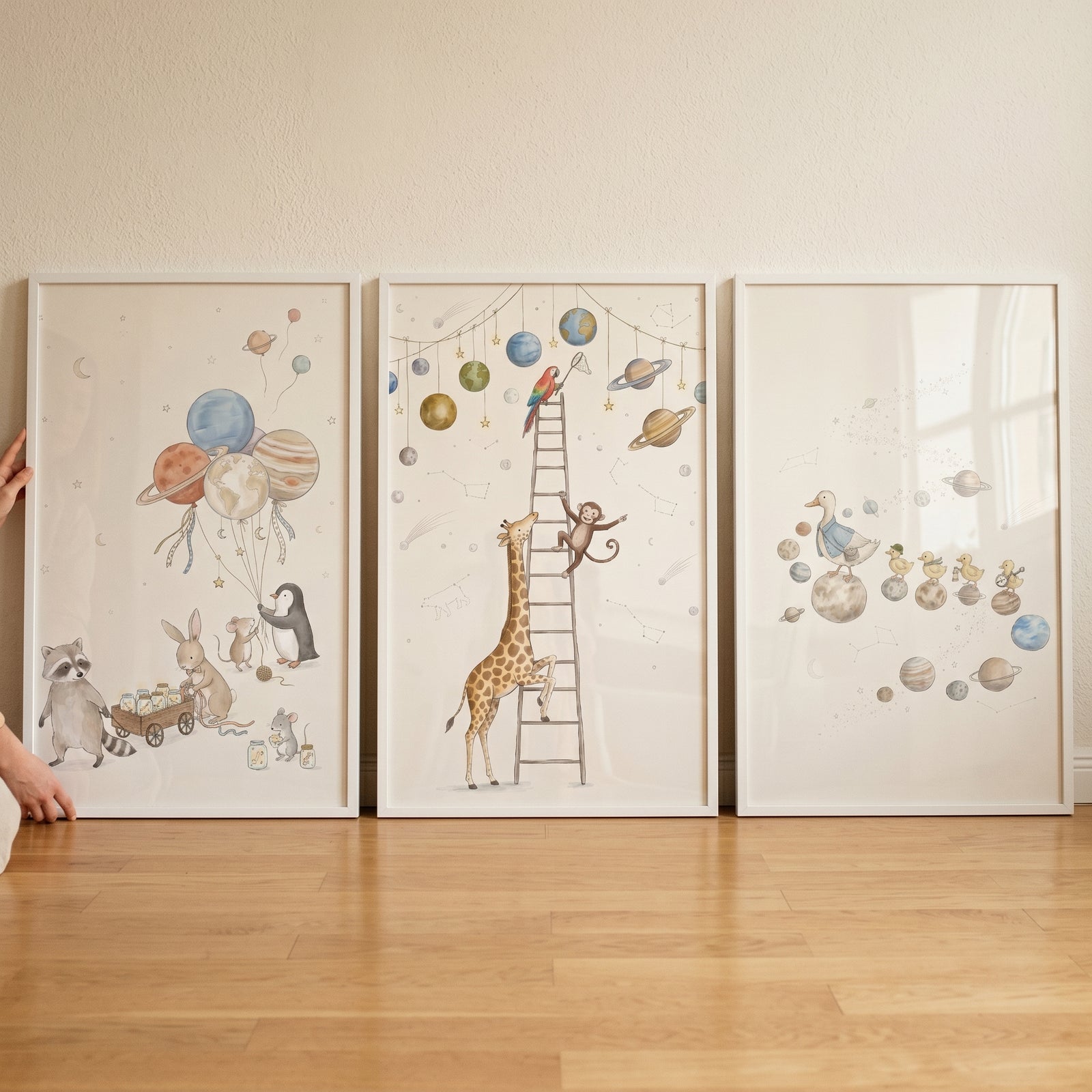 Vintage solar system animals wall art set of 3 featuring whimsical watercolor illustrations of a giraffe and ducklings.