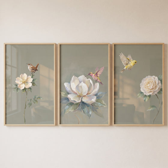 Vintage style botanical bird artwork set of 3 with birds and white flowers on a muted green background.