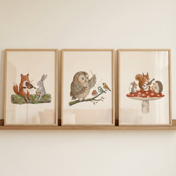 Vintage style instrumental animal wall art set of 3 with forest animals playing music on a log, branch, and mushroom.