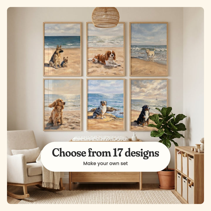 Nursery with six beach dog prints in light wood frames in two rows on a cream wall above a wood changing table, beside a cream rocking chair, a fiddle leaf fig, a cube shelf with fabric bins and a woven rug: a German shepherd with a Yorkshire terrier, a Cavalier King Charles spaniel, a yellow Labrador, a golden cocker spaniel, an Australian shepherd and a Bernese mountain dog, labeled Choose from 17 designs, Make your own set