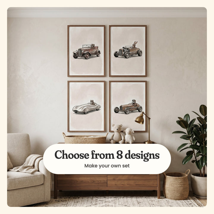 Neutral room with four vintage racing prints in dark wood frames in two rows above a walnut dresser with a woven basket, plush toys and a brass lamp, beside a cream armchair, a potted rubber plant and a tall basket: a raccoon in an open roadster with red seats, a hare in a hot rod with a big chrome engine, a tabby cat in a silver streamlined racer and a badger in a single-seat racer, labeled Choose from 8 designs, Make your own set