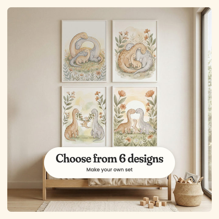 Kids' room with four dinosaur family prints in white frames in two rows above a light wood toddler bed with linen bedding, beside a big window, a basket of wooden blocks and a fringed rug: the parents arching their necks over their baby at sunset, the parents curled around their baby, the baby swinging from a vine and the parents nose to nose before a pale sun, labeled Choose from 6 designs, Make your own set