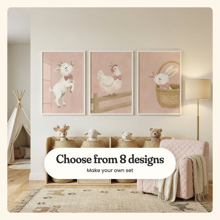 Cream nursery with three farm animal prints in white frames above a low shelf of woven baskets holding a plush fawn, a lamb and two bears, beside a white play tent, a brass floor lamp, a pink quilted armchair with a throw and a rug with paw prints: Dapper Baby Goat, Sweet Pink Hen and Sweetest Basket Bunny, labeled Choose from 8 designs, Make your own set