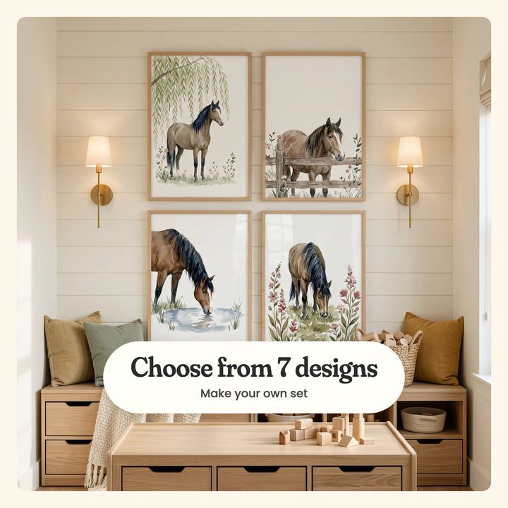 Reading nook with four brown horse prints in light wood frames in two rows on a shiplap wall between two brass sconces, above a window bench with mustard and sage cushions, a basket of wooden blocks and a light wood play table: a horse under a willow tree, a horse at a wooden fence, a horse drinking from a pond and a horse grazing among pink flowers, labeled Choose from 7 designs, Make your own set
