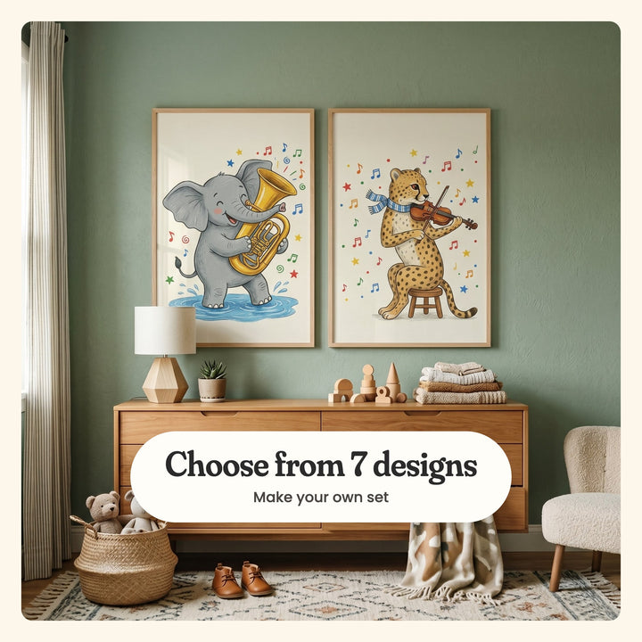 Sage green nursery with two music-playing animal prints in light wood frames above a light wood dresser with a lamp and wooden toys, beside a basket of plush toys, little brown shoes and a cream chair: Elephant's Musical Puddle and Musical Cheetah, labeled Choose from 7 designs, Make your own set