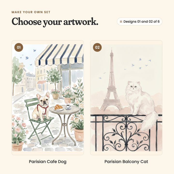 Designs 01 and 02 of 6: Parisian Cafe Dog, a French bulldog on a green cafe chair beside a croissant and a coffee, under a striped awning, and Parisian Balcony Cat, a fluffy white cat on an iron balcony with the Eiffel Tower behind