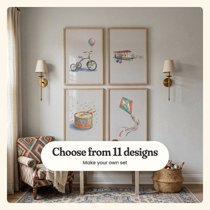 Four vintage carnival prints in light wood frames between brass sconces above a patterned armchair and a woven basket: a tricycle, a biplane, a drum and a kite, labeled Choose from 11 designs, Make your own set