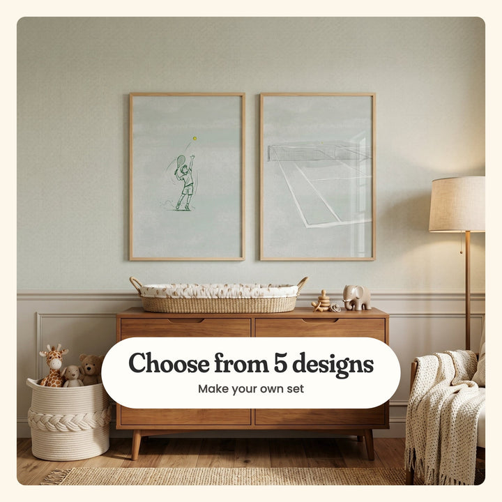 Sage green panelled nursery with two tennis prints in light wood frames above a walnut dresser with a woven changing basket and wooden toys, beside a rope basket of plush animals, a floor lamp and an armchair with a knit throw: High Toss Serve and Solitary Game, labeled Choose from 5 designs, Make your own set