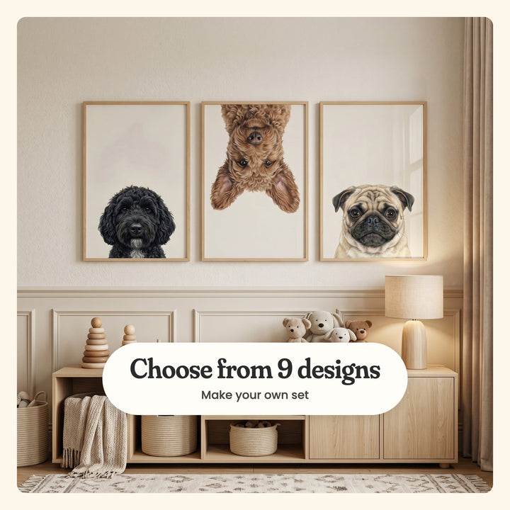 Nursery with three dog portrait prints in light wood frames on a beige wall above a light wood sideboard with stacking toys, plush teddies and a woven basket: a black curly dog, an upside-down curly red-brown dog and a pug, labeled Choose from 9 designs, Make your own set