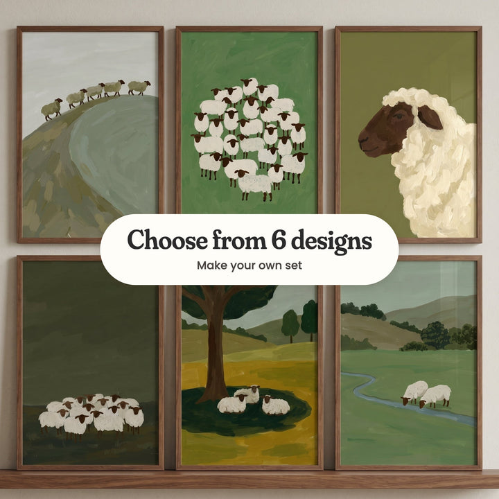Six sheep prints in walnut frames in two rows on a wood ledge: five sheep on a grey-green ridge, a round huddle of sheep on bright green, a close-up of a woolly sheep with a brown face, a small flock under a dark olive sky, three sheep resting in a big tree's shade and two sheep drinking at a stream, with a label reading Choose from 6 designs, Make your own set