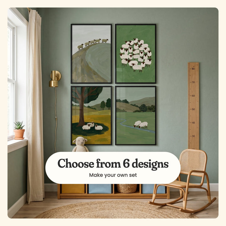 Kids' room with a sage wall and four sheep prints in black frames in two rows beside a brass sconce and a wooden growth-chart ruler, above a rattan rocking chair, a cube shelf with colored bins and a plush sheep on a jute rug: five sheep on a hill ridge, a round huddle of sheep, three sheep resting in a tree's shade and two sheep drinking at a stream, labeled Choose from 6 designs, Make your own set