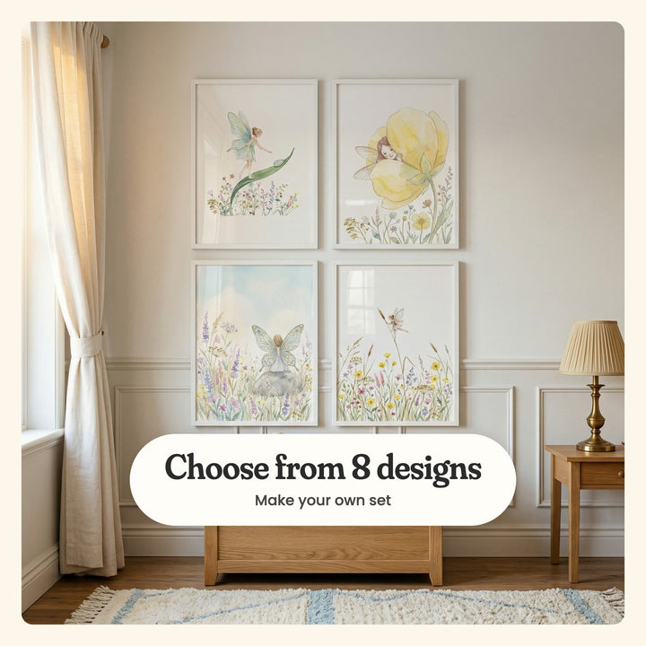 Four fairy prints in white frames in two rows on a panelled cream wall beside a linen curtain, a wood side table with a brass lamp and a wood chest on a blue and cream rug: a fairy walking up a long leaf, a fairy peeking out of a yellow flower, a fairy sitting on a rock among wildflowers and a tiny fairy holding a cattail above buttercups, labeled Choose from 8 designs, Make your own set