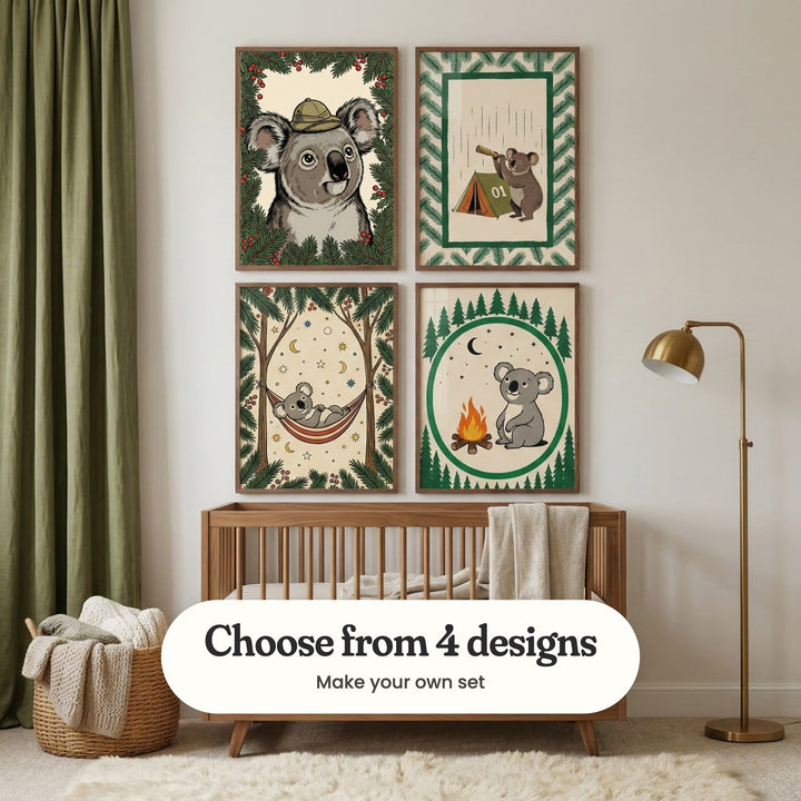 White nursery with four koala prints in dark wood frames in two rows above a walnut crib with a knit blanket, beside a brass floor lamp, an olive green curtain, a woven basket of blankets and a shaggy rug: Little Bushland Scout, Stargazing Scout, Dreamy Forest Nap and Starry Koala Gaze, with a label reading Choose from 4 designs, Make your own set