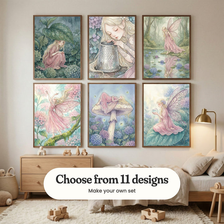 Cream kids' room with six fairy prints in dark wood frames in two rows above a light wood dresser with wooden toys and a low bed with soft pillows, beside a brass floor lamp: Rainy Leaf Shelter, Enchanted Thimble Rest, Winged Forest Serenity, Floral Winged Sprite, Whimsical Forest Slumber and Mystic Garden Fairy, with a label reading Choose from 11 designs, Make your own set