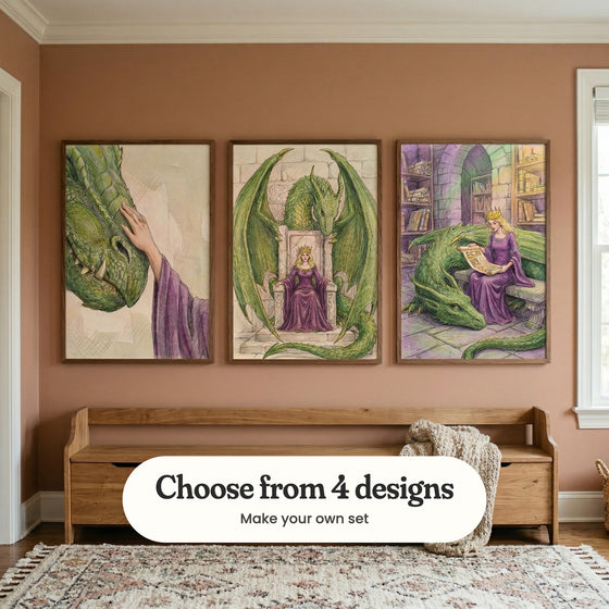 Dusty pink room with three dragon prints in dark wood frames above a wooden storage bench with a knit throw, beside a window and a patterned rug: Gentle Beast Touch, Royal Dragon Guardian and The Dragon's Library, with a label reading Choose from 4 designs, Make your own set