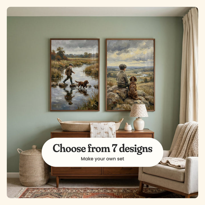 Sage green nursery with two boy and dog prints in dark wood frames above a walnut dresser with a changing basket and a lamp, beside a cream armchair and a patterned rug: Crossing The Stream and Loyal Companions, labeled Choose from 7 designs, Make your own set