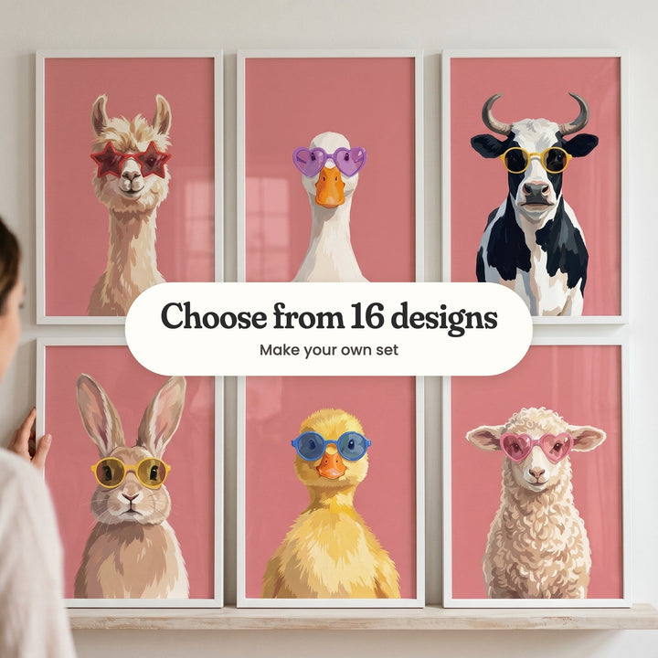 Six farm animal portraits in white frames on a picture ledge, with a woman reaching up: a llama in star glasses, a duck in heart glasses, a cow in yellow glasses, a bunny in round glasses, a duckling in blue glasses and a lamb in heart glasses, with a label reading Choose from 16 designs, Make your own set