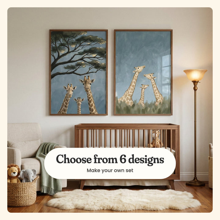 Cream nursery with two giraffe prints in dark wood frames above a walnut crib, beside an armchair with a green throw, a basket with a plush lion and elephant, and a floor lamp: Gentle Giants Trio and Giraffe Family Trio, labeled Choose from 6 designs, Make your own set