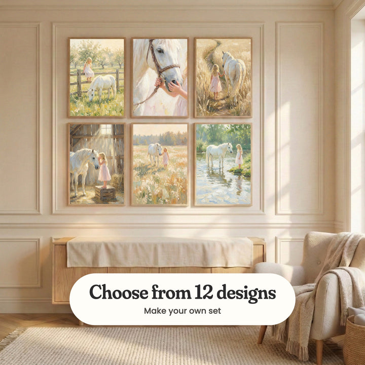 Cream panelled nursery with six girl and white horse prints in light wood frames in two rows above a light wood changing cabinet, beside a cream armchair with a throw: Meadow Friends, Gentle White Bond, Golden Summer Walk, Sunlit Stable Secret, Meadow Harmony and Quiet River Encounter, with a label reading Choose from 12 designs, Make your own set