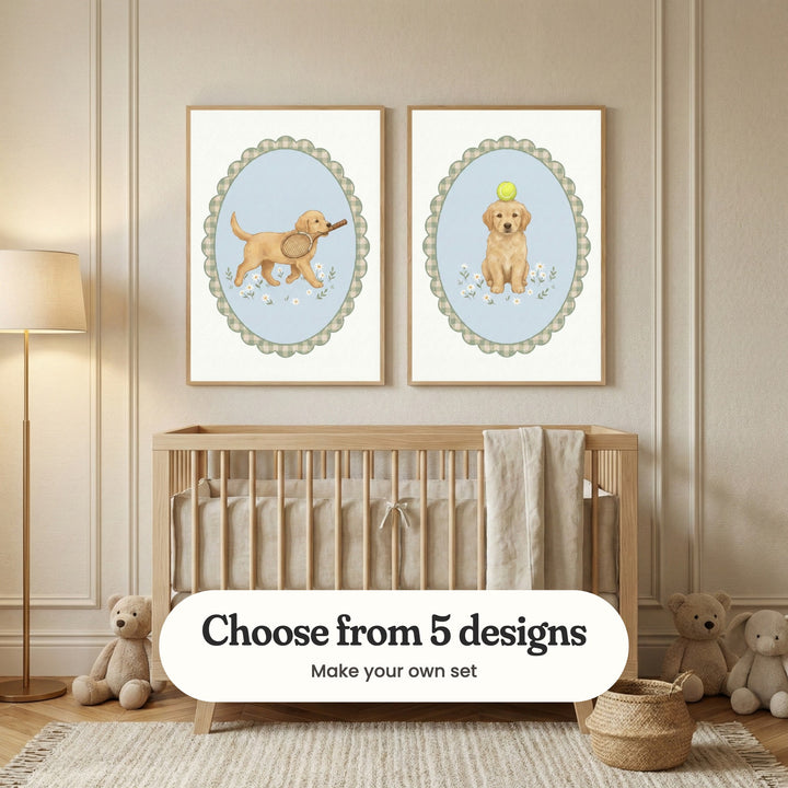 Cream panelled nursery with two golden puppy prints in light wood frames above a light wood crib with a linen blanket, beside teddy bears, a woven basket and a floor lamp: Golden Racket Pup and Golden Puppy Balance, with a label reading Choose from 5 designs, Make your own set