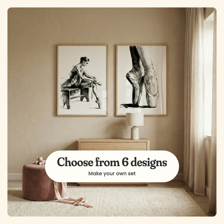 Beige room with two ballet prints in light wood frames above a small oak dresser with a table lamp, beside a dusty pink ottoman with a little plush bear and a pink ribbon: Ribbon Tying Ballerina and Graceful Pointe, labeled Choose from 6 designs, Make your own set