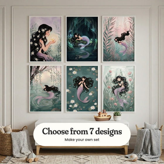 Pale grey panelled room with six mermaid prints in white frames in two rows above a white dresser with a toy boat and a small plant, beside baskets with knit throws and a patterned rug: Luminous Pearl Mermaid, Glowing Mermaid Dream, Ethereal Sea Maiden, Willow Pond Mermaid, Serene Pond Maiden and Sleeping Floral Mermaid, with a label reading Choose from 7 designs, Make your own set