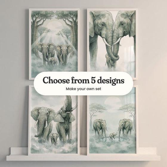 Four misty elephant family prints in white frames on a white picture ledge: elephants between tall trees with sun rays, two with trunks entwined over their calf, a family with one trumpeting and a calf splashing in a waterhole, with a label reading Choose from 5 designs, Make your own set