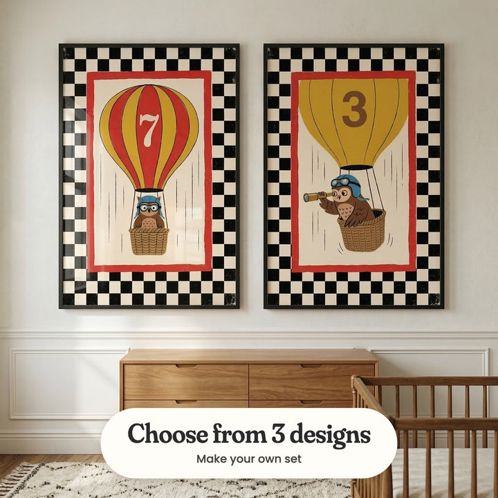 Pale grey panelled room with two owl balloon prints in black frames above a wood dresser, beside a wood crib and a patterned rug: Aviator Owl and Wise Skyward Watcher, with a label reading Choose from 3 designs, Make your own set