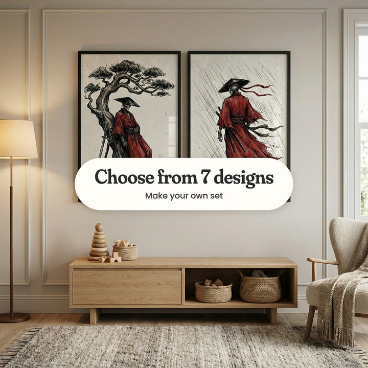 Two skeleton samurai prints in black frames above a low light wood cabinet with a wooden stacking toy and woven baskets, beside a floor lamp and an armchair: one leaning on a twisted pine with his swords and one walking away in the rain, each in a red robe and a wide hat, with a label reading Choose from 7 designs, Make your own set