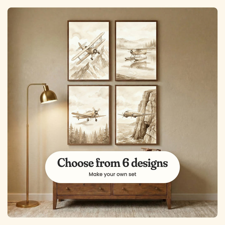Taupe wall with four vintage airplane prints in walnut frames in two rows above a low walnut dresser with a small wooden toy plane, beside a brass floor lamp on a cream rug: a biplane over snowy peaks, a floatplane on a misty lake, a single-prop plane over a pine forest and a twin-engine airliner past sea cliffs, labeled Choose from 6 designs, Make your own set