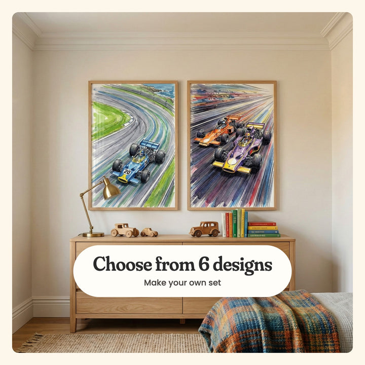 Kids' room with two race car prints in light wood frames above an oak dresser with a brass desk lamp, wooden toy cars and a stack of books, beside a bed with a plaid throw on a jute rug: a blue No. 20 car on a curving coastal track and two cars racing through rainbow speed lines, labeled Choose from 6 designs, Make your own set