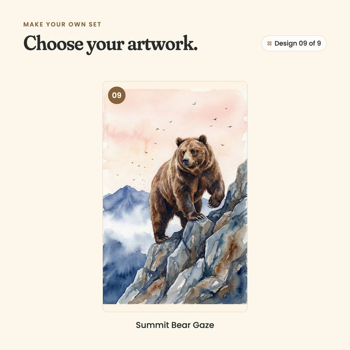 Design 09 of 9: Summit Bear Gaze, a bear climbing a rocky peak, with birds in a pink sky