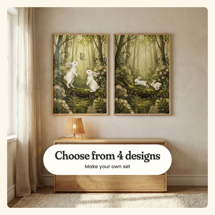 Warm beige room with two bunny prints in light wood frames above a low light wood chest with a woven lamp, beside a window with a linen curtain and a cream rug: Woodland Bunny Friends and Forest Rabbit Leap, labeled Choose from 4 designs, Make your own set