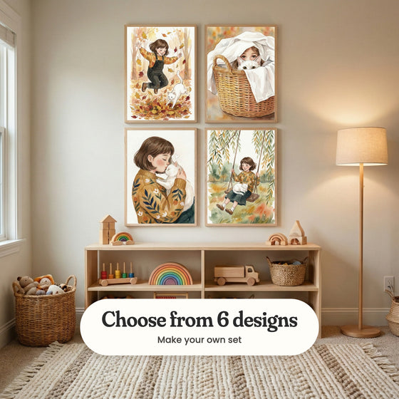 Warm beige nursery with four girl and cat prints in light wood frames in two rows above a low wood shelf with wooden toys and a rainbow stacker, beside a floor lamp and a basket of plush toys: Autumn Leaf Leap, Laundry Day Friends, Cozy Cat Hug and Whimsical Willow Swing, with a label reading Choose from 6 designs, Make your own set