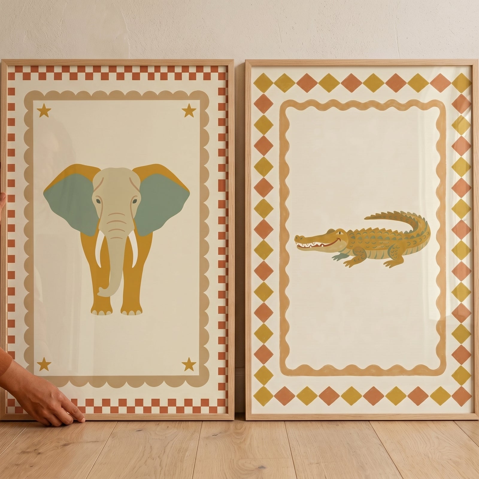 Warm ochre safari animal wall art set of 2 featuring an elephant and a crocodile in light wood frames.