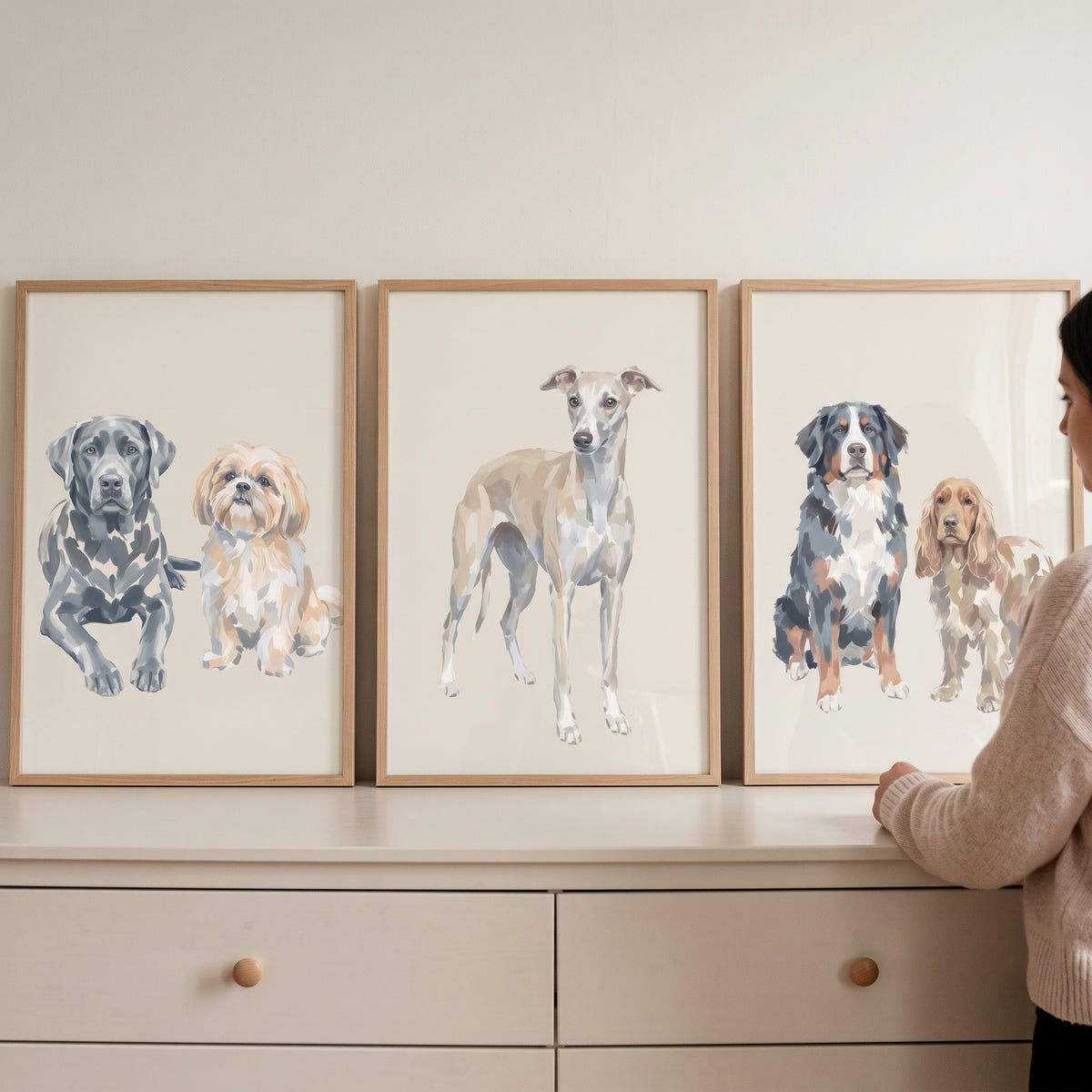 Warm painterly multi dogs wall art set of 3 featuring various breeds displayed on a neutral dresser.