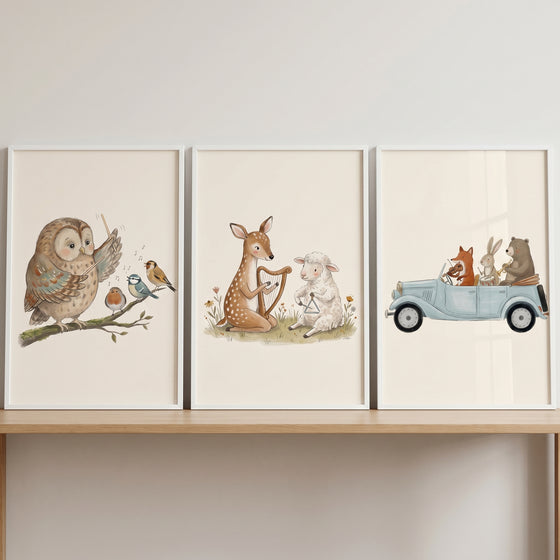 Warm tone forest animal wall art set of 3 with an owl conductor, musical fawn and lamb, and animals in a blue vintage car.