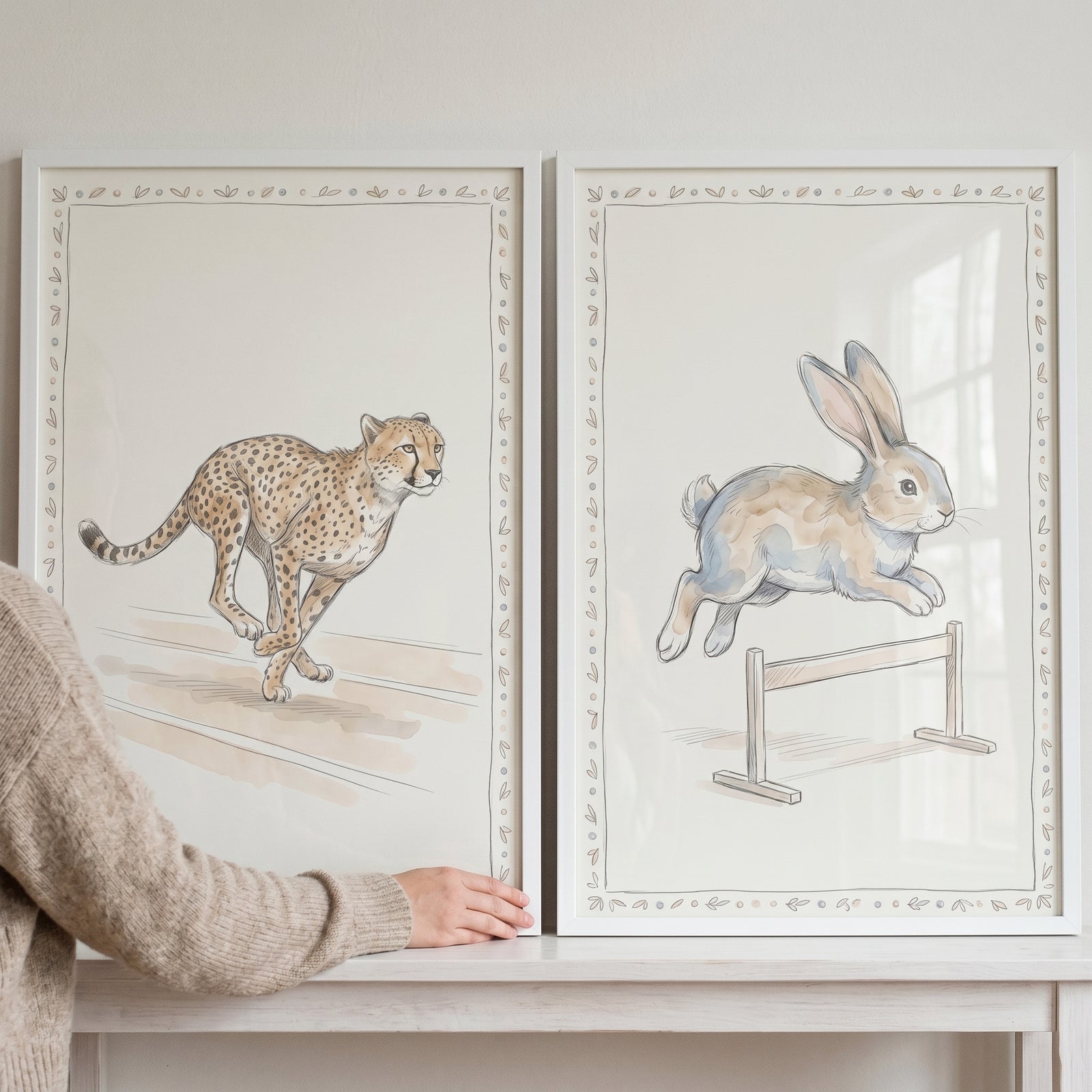 Two watercolor framed illustrations of a running cheetah and jumping rabbit. wash active animals wall art set of 2.