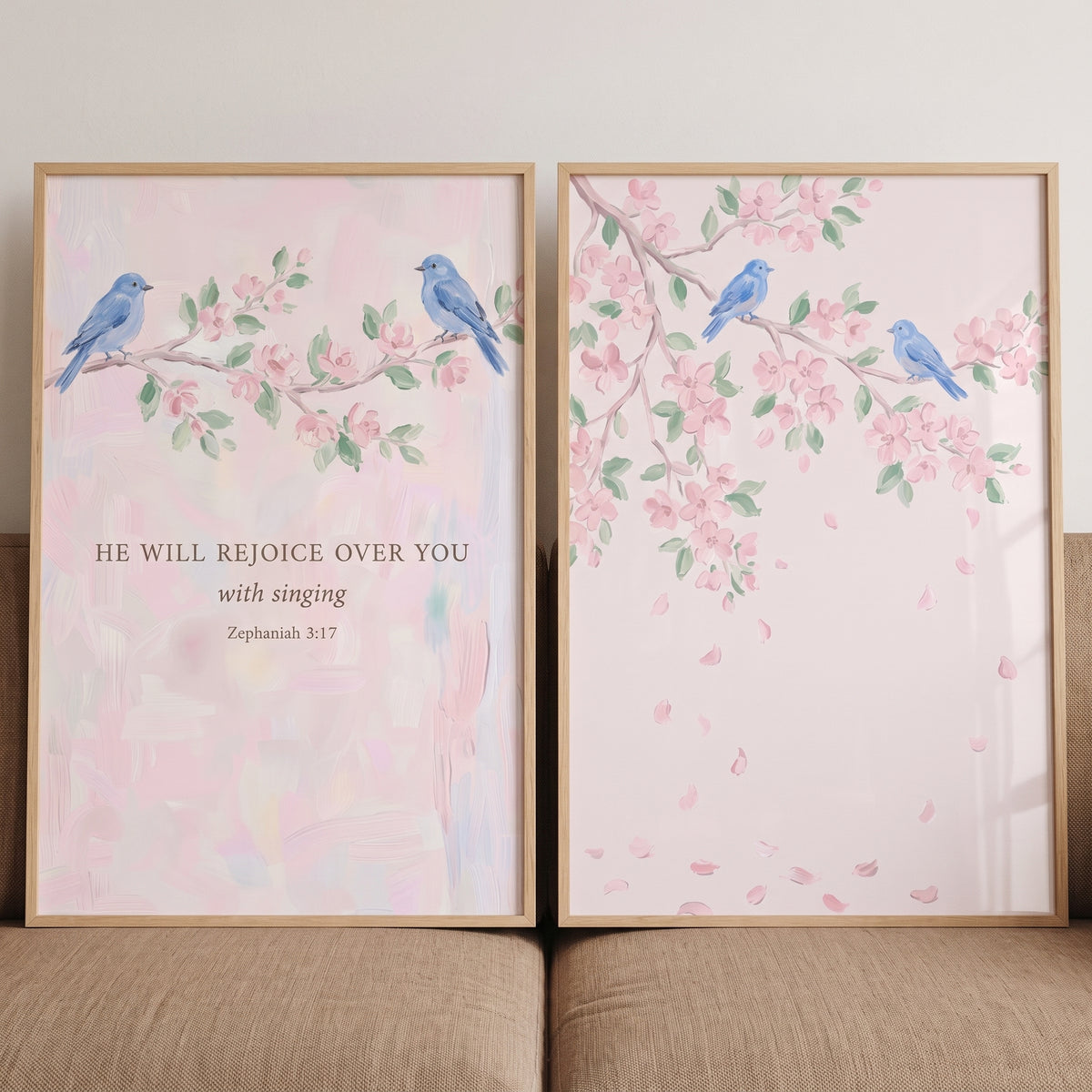 Watercolor azure blue bird wall art set of 2 features birds on pink blossom branches with scripture and falling petals.