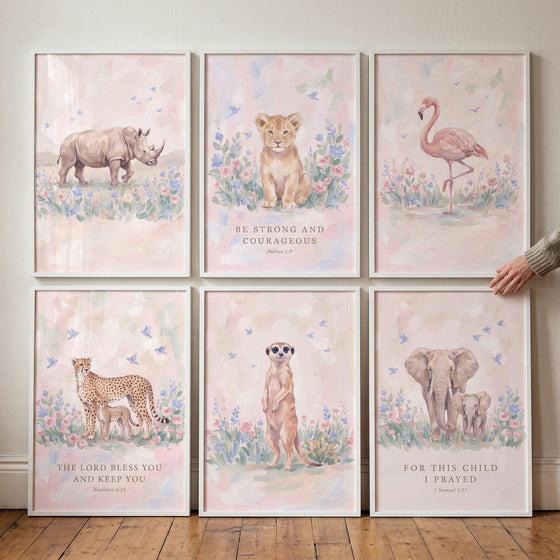 watercolor bird safari animal wall art set of 6 featuring soft pink animals and biblical quotes in white frames.