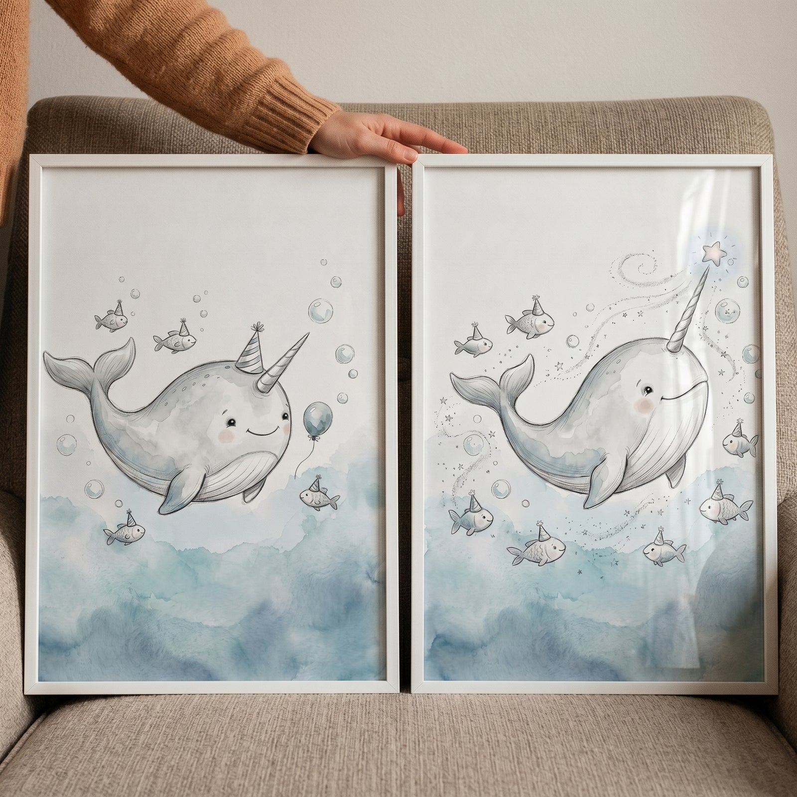 Watercolor blue narwhal wall art set of 2 featuring narwhals and fish wearing party hats among bubbles and clouds.