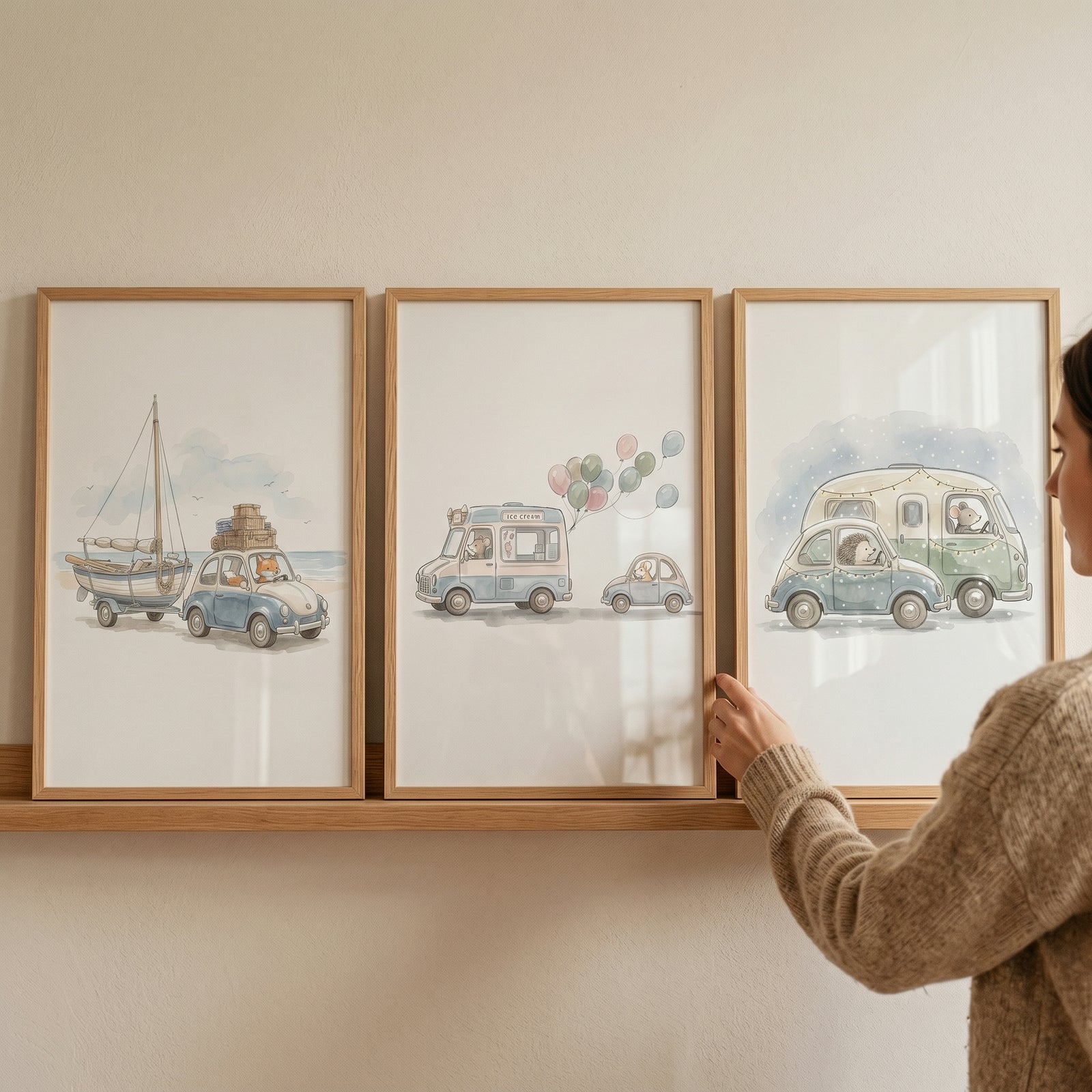 Watercolor blue vehicle animals wall art set of 3 on a shelf featuring creatures in cars, a boat, and a camper.
