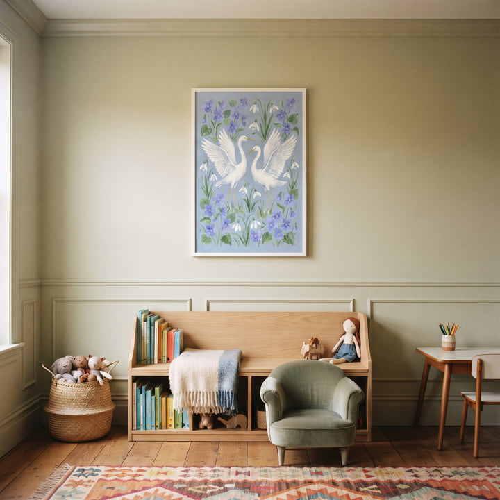 Watercolor blue white egret bird wall art above a wooden storage bench and green velvet armchair in a child's room.
