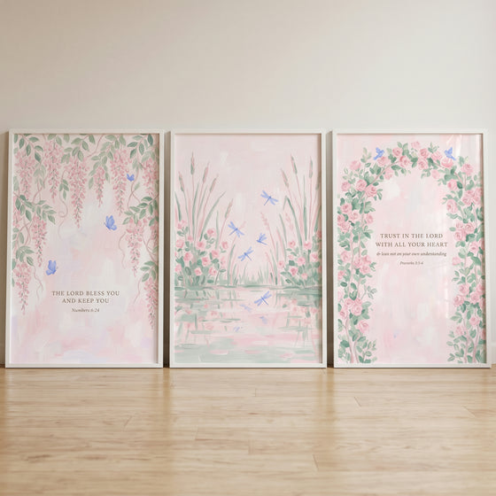 Watercolor blush floral garden wall art set of 3 featuring wisteria, dragonflies, a rose arch, and Bible verses.
