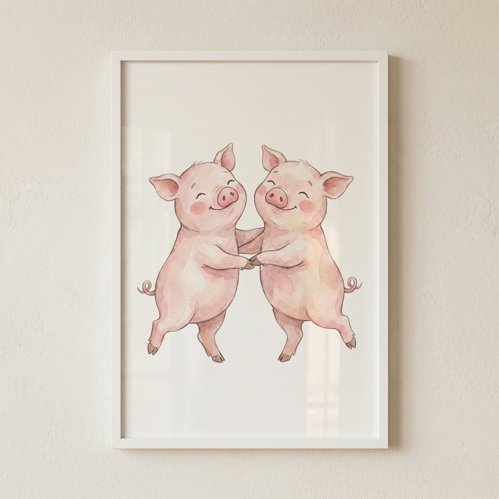 Watercolor dancing pink pigs wall art featuring two happy pigs holding trotters and dancing in a white frame.