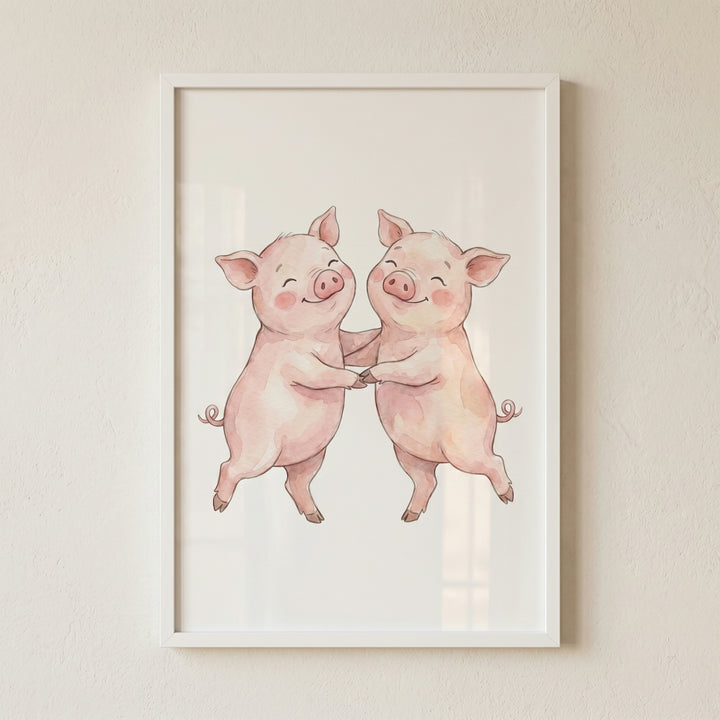 Watercolor dancing pink pigs wall art featuring two happy pigs holding trotters and dancing in a white frame.
