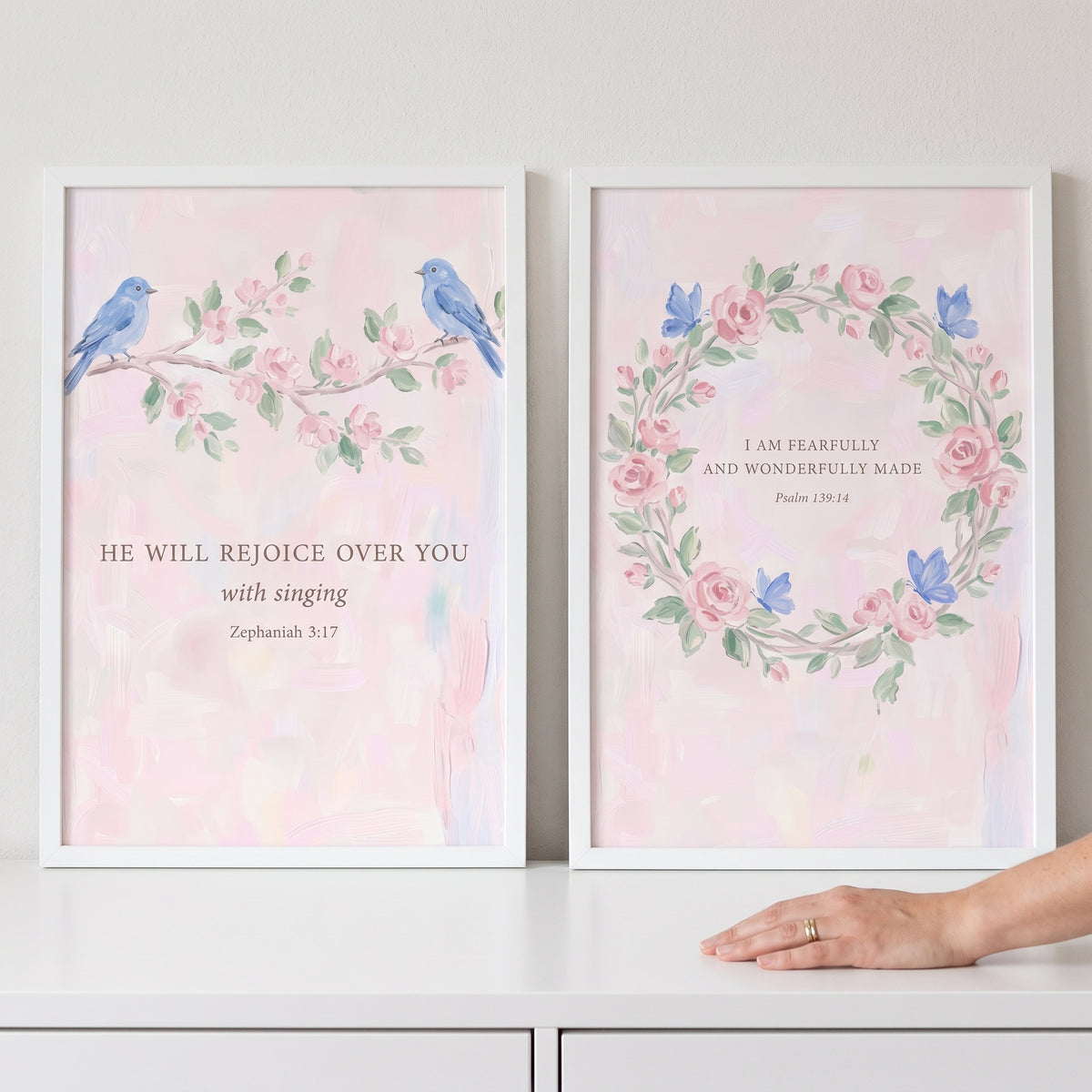 Watercolor feminine floral scripture wall art set of 2 with blue birds, a flower wreath, and butterflies.