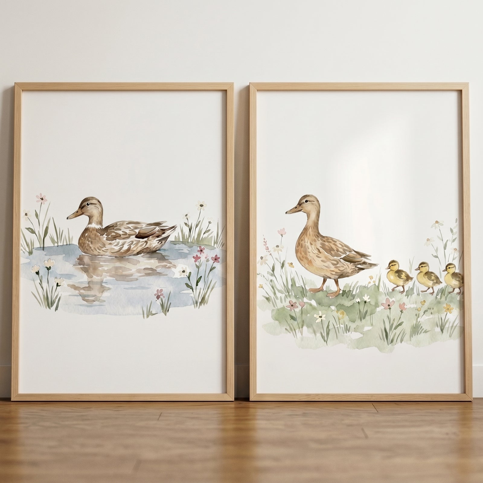 Watercolor floral brown duck wall art set of 2 featuring a duck on a pond and one walking with ducklings.