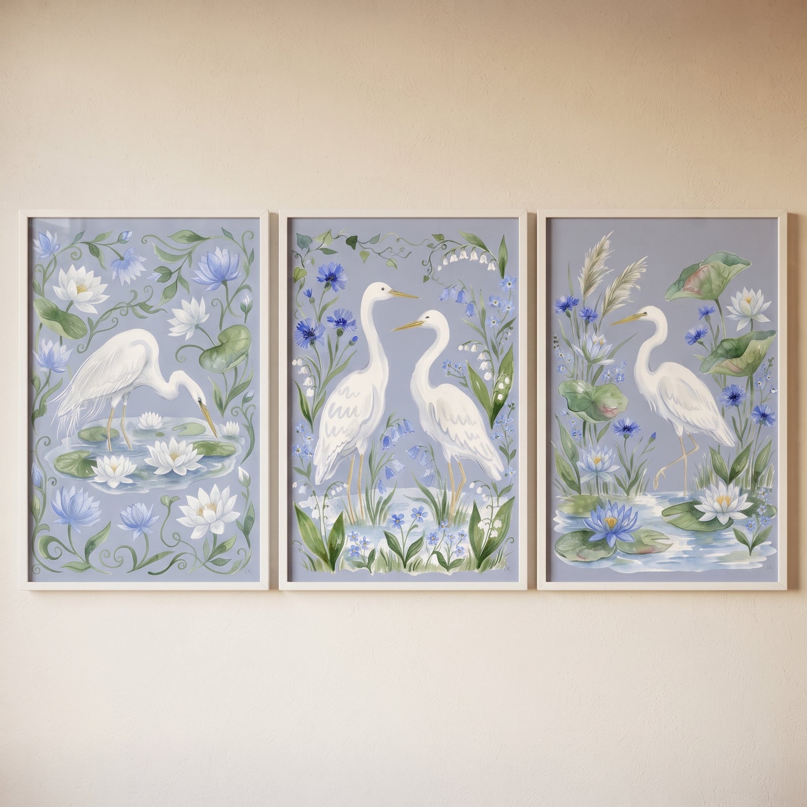 Watercolor floral egret bird wall art set of 3 featuring white herons and lotus flowers in a soft botanical landscape.