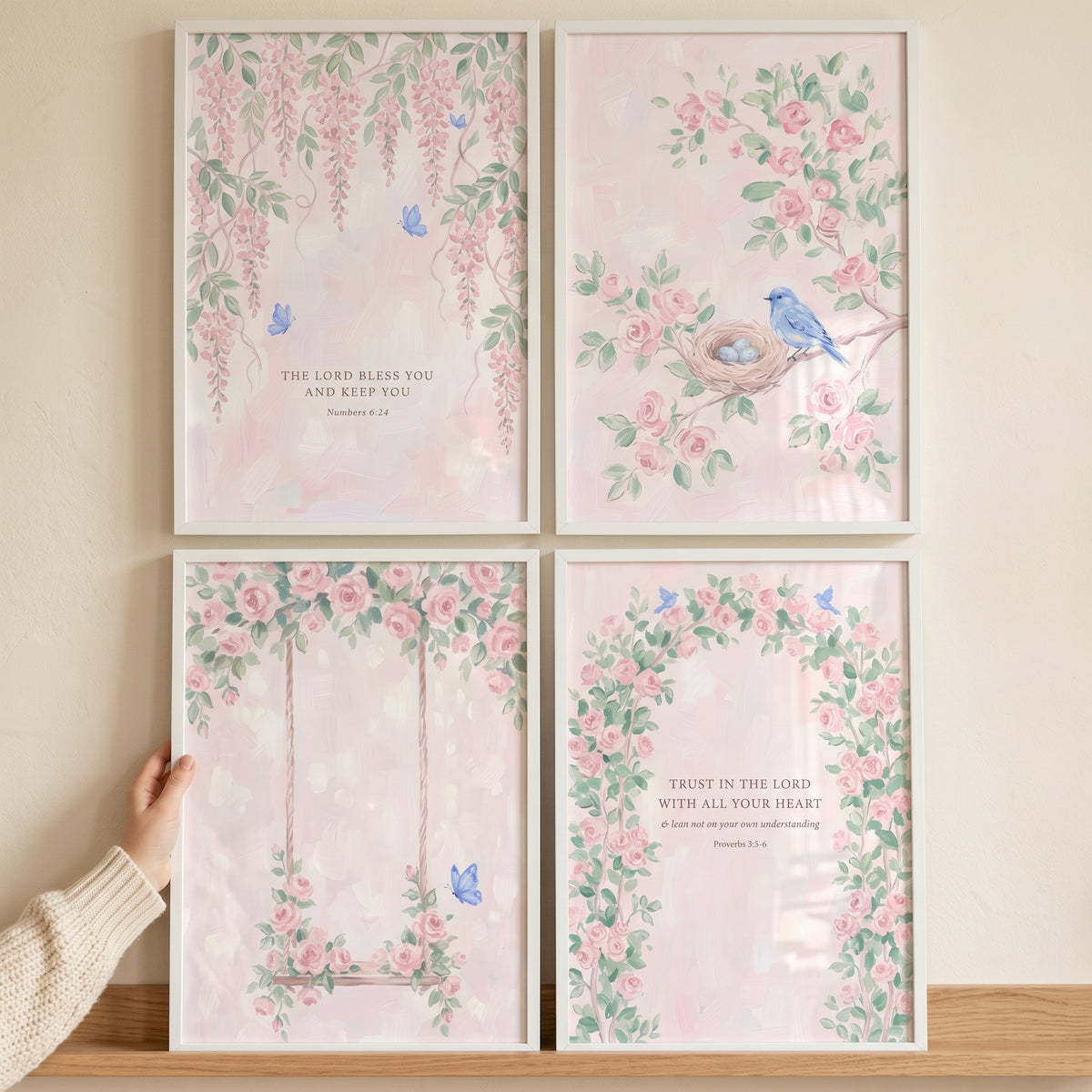 Watercolor floral scripture wall art set of 4 features pink roses, wisteria, and blue birds in white frames.